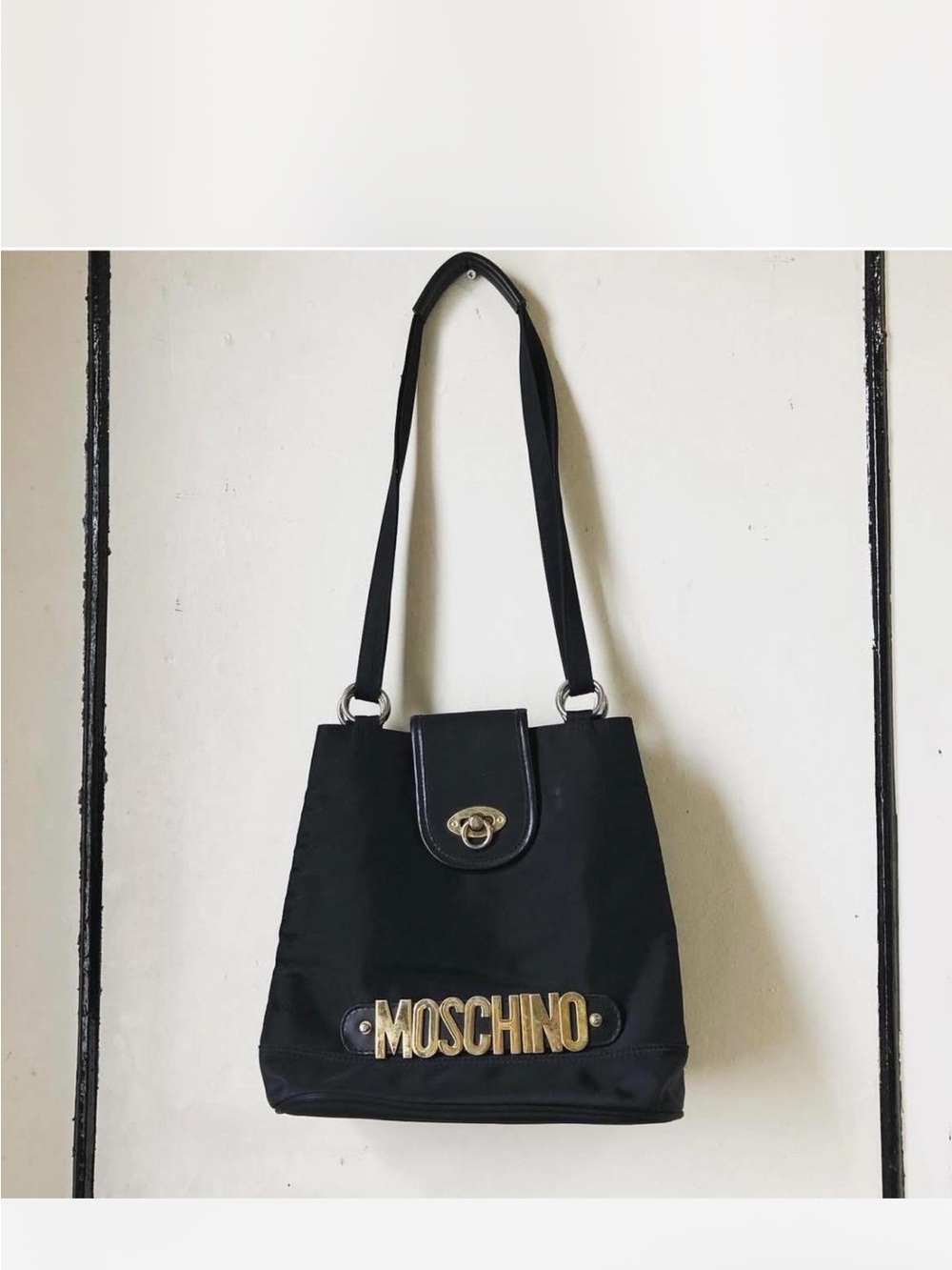 Moschino Black Shoulder Bag with Gold Logo Plaque